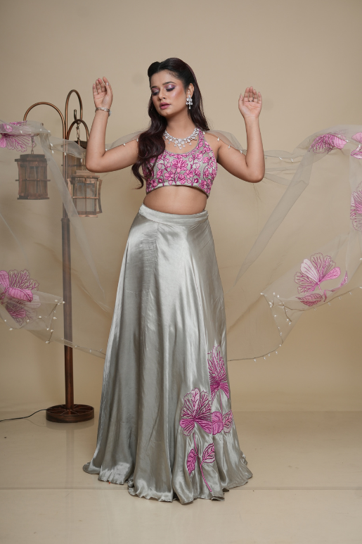 Lehenga choli in steel grey with pink flowers on blouse dupatta and skirt